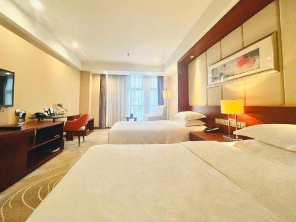 Grand Metropark Hotel Shangqiu Екстер'єр фото